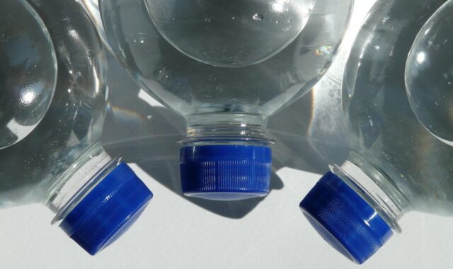 bottles, plastic bottle, bottle, sparkling water, water, transparent, lid, blue, tight, drink, carbonic acid, quiet, refreshing, refreshment, lie, air bubble, horizontally, closure, screw cap, close, three, nature, domestic animal, polyethylene terephthalate