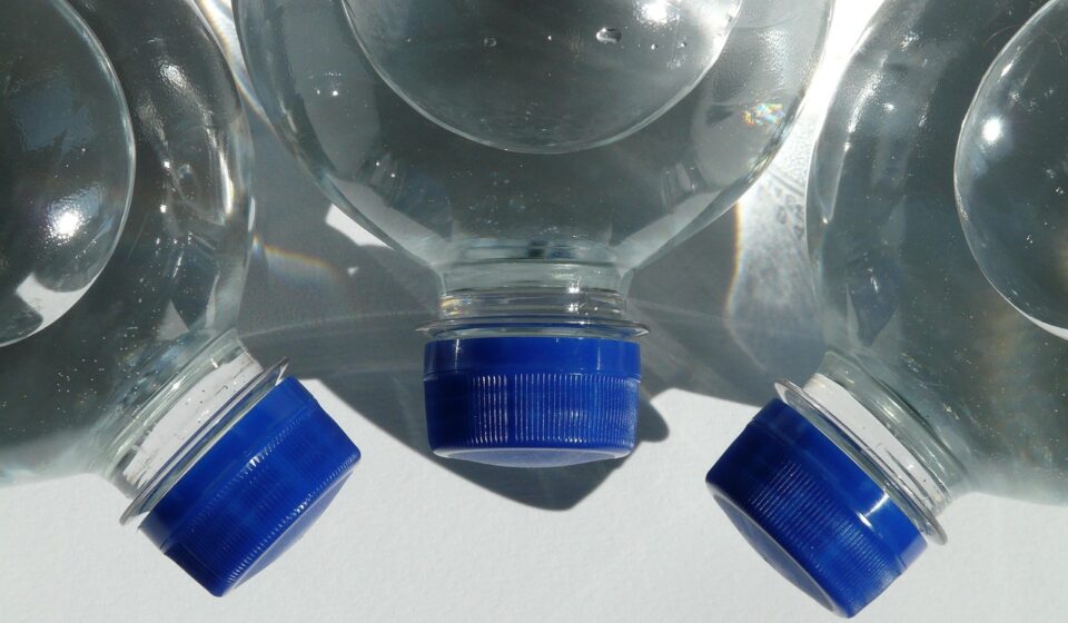 bottles, plastic bottle, bottle, sparkling water, water, transparent, lid, blue, tight, drink, carbonic acid, quiet, refreshing, refreshment, lie, air bubble, horizontally, closure, screw cap, close, three, nature, domestic animal, polyethylene terephthalate