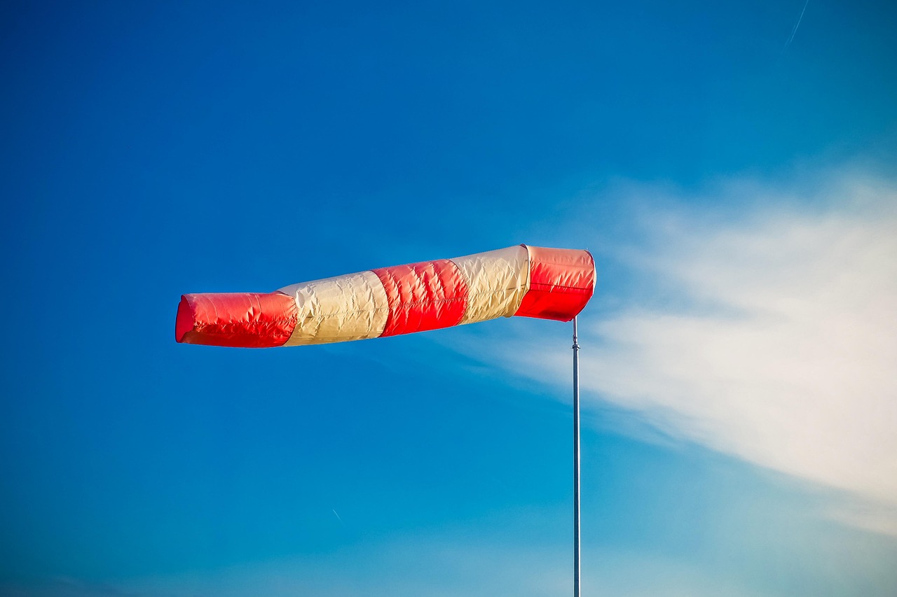 air bag, wind sock, weather, heaven, striped, wind direction, red, windy, flutter, wind force, mast, material, blow, wind, anemometer, wind vane, weather vane, cross wind, wind direction indicator, orientation, regional aerodrome, white, wind indicator, blue, indicator, plastic flag, wind sock, windy, windy, windy, windy, windy