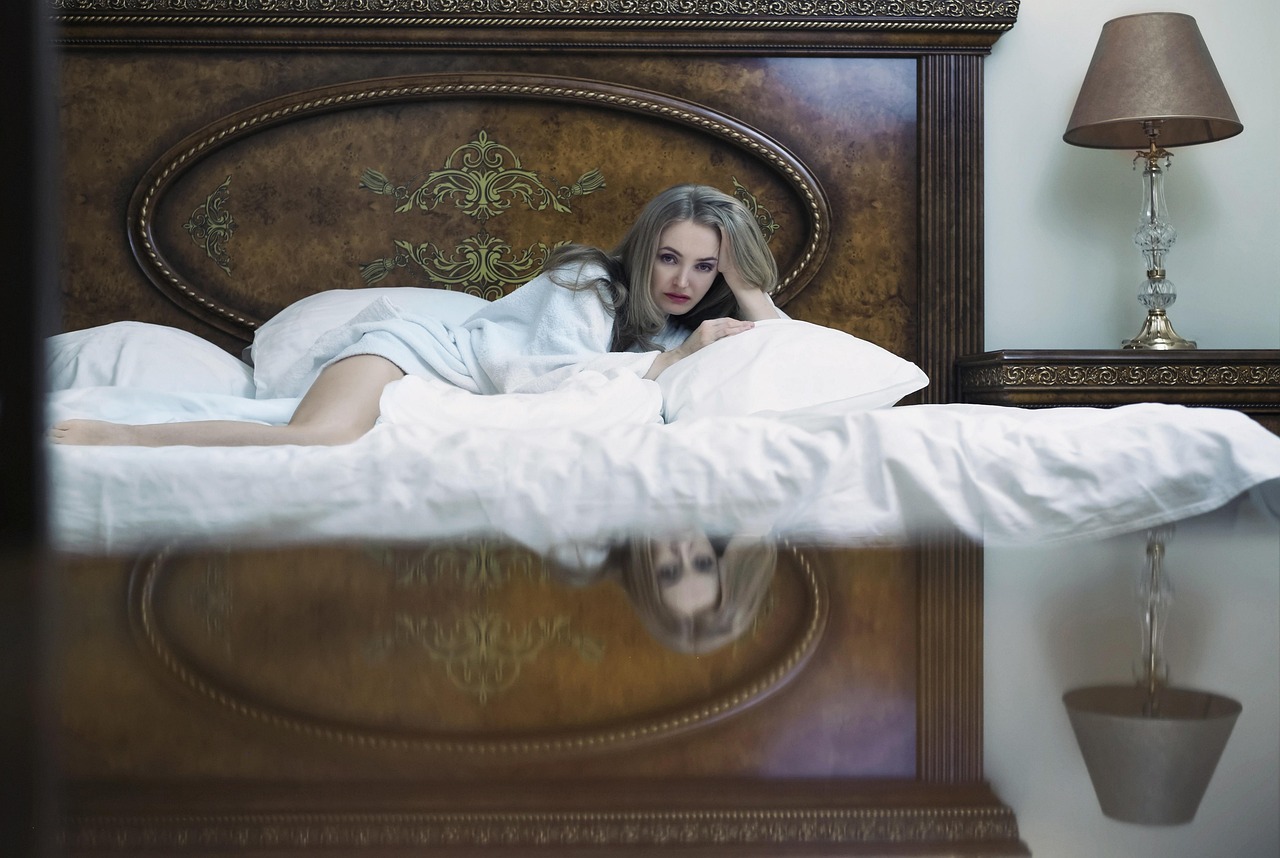 young woman, bedroom, sconce, bed, mirror, blonde, robe, sheet, reflection, leg, person, eyes, fatigue, expectation, pillows, beautiful, interior, room, pose, hotel, bedroom, bed, bed, mirror, robe, robe, robe, robe, fatigue, fatigue, fatigue, fatigue, fatigue